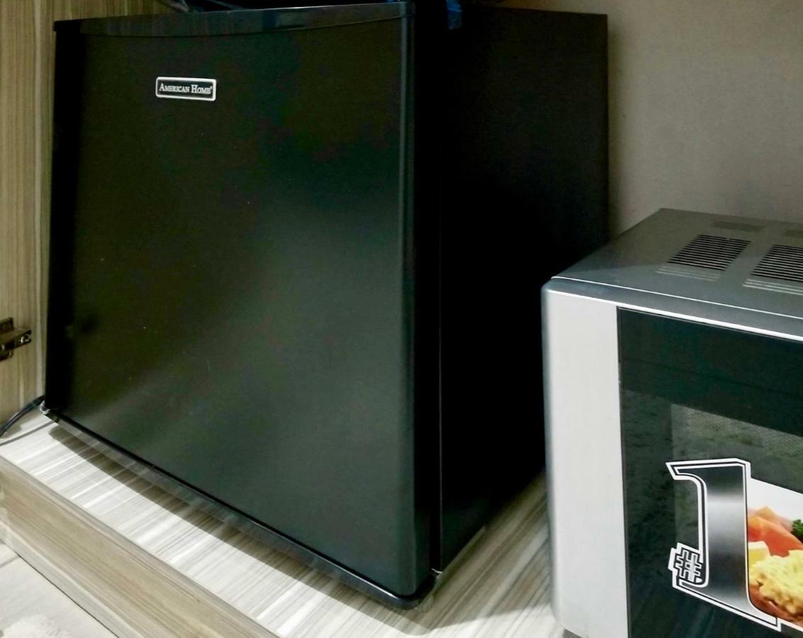 Super Cute Hampton Suites Imus Екстер'єр фото